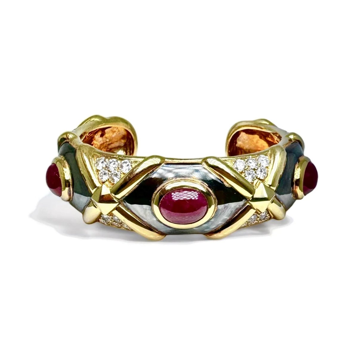 Bracelet vintage jonc en or noirci et jaune orné de rubis et diamants. - Castafiore
