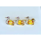 Broche 3 canards en or, saphirs jaunes, diamants et rubis - Castafiore