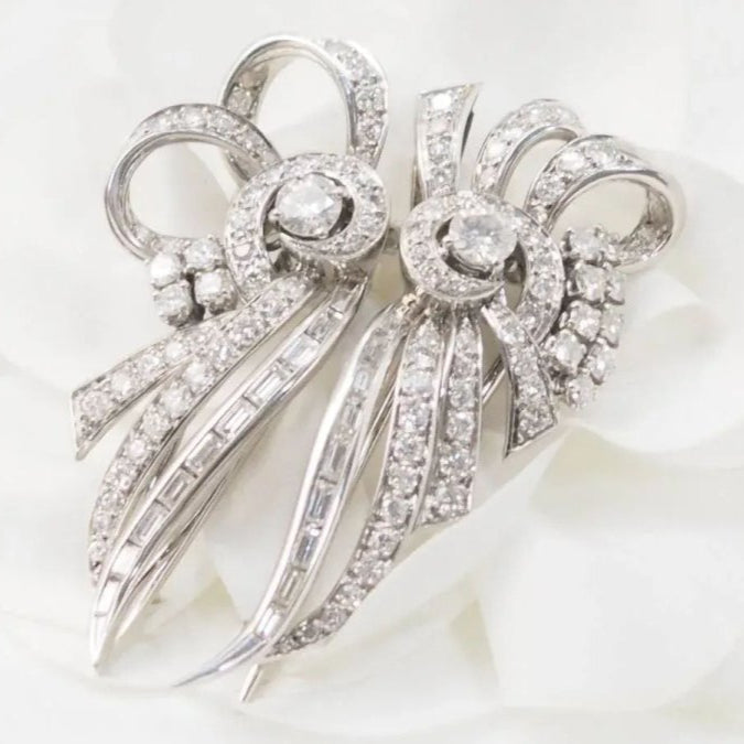 Broche Art déco double clips en or blanc et platine, diamants - Castafiore