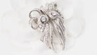 Broche Art déco double clips en or blanc et platine, diamants - Castafiore