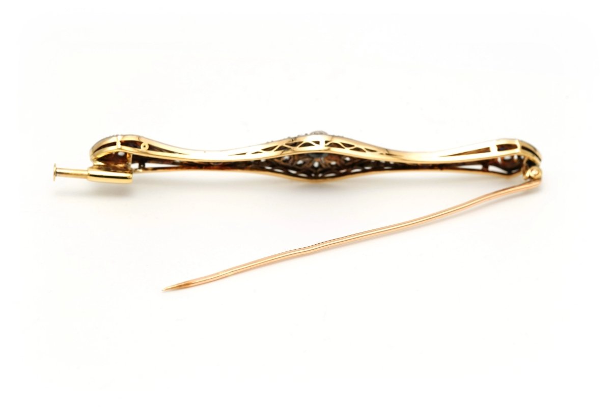 Broche Barrette en or blanc, or jaune, onyx, saphirs et diamants - Castafiore