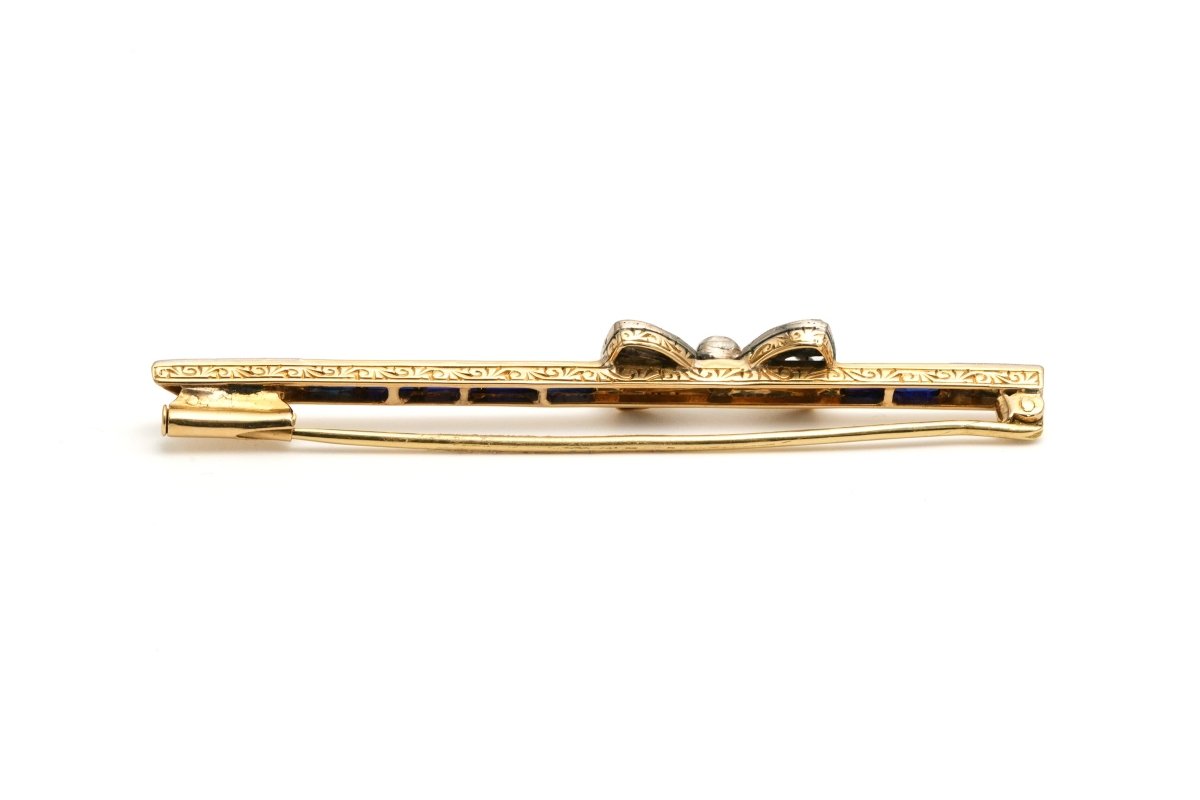 Broche Barrette en or blanc, or jaune, saphirs et diamants - Castafiore