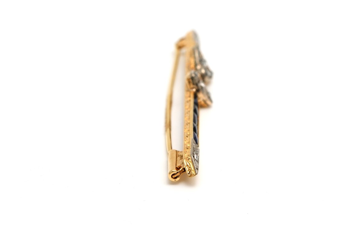 Broche Barrette en or blanc, or jaune, saphirs et diamants - Castafiore