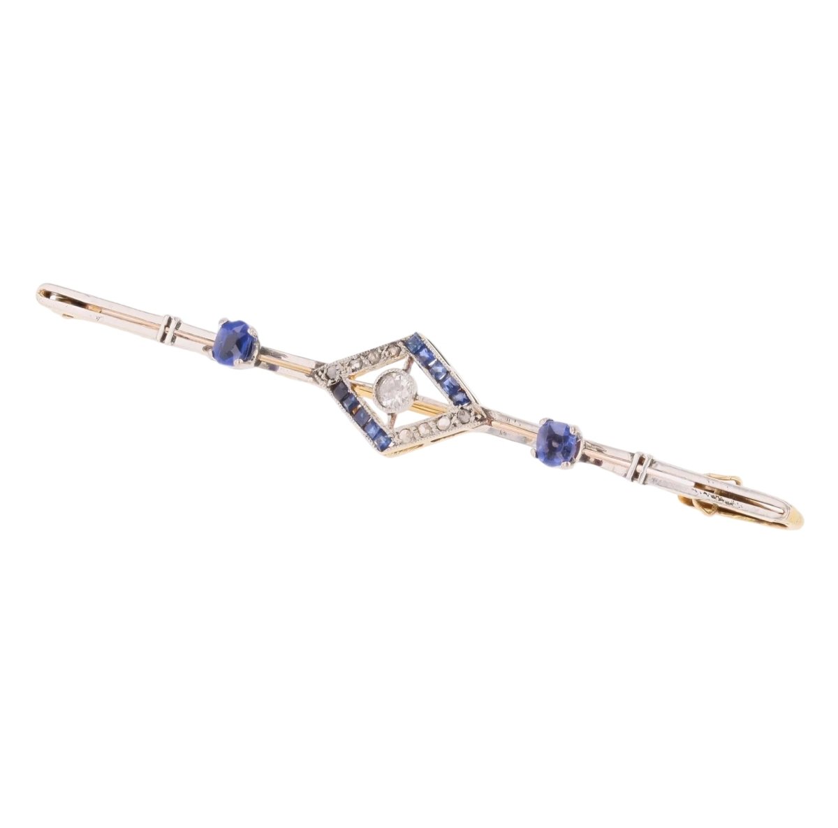 Broche Barrette en or jaune, platine, saphirs et diamants - Castafiore