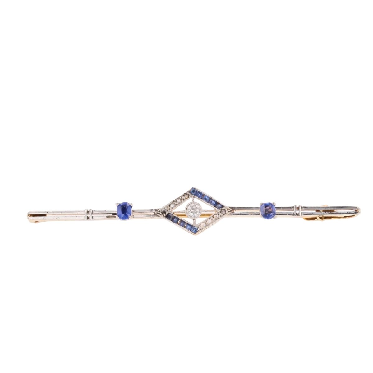 Broche Barrette en or jaune, platine, saphirs et diamants - Castafiore