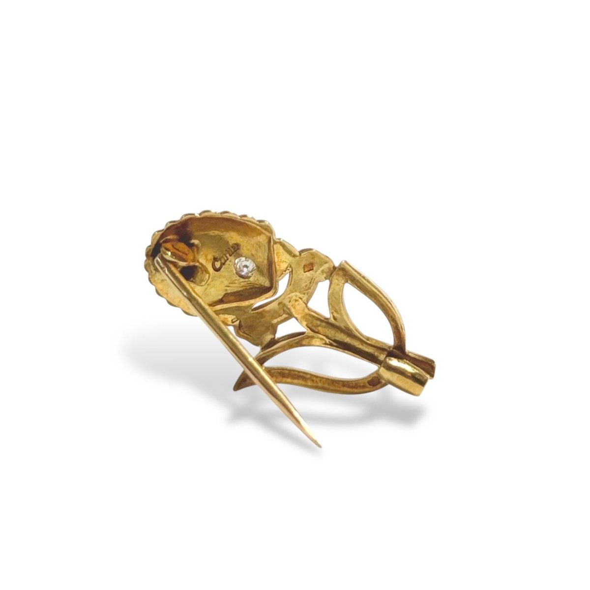 Broche CARTIER coquille feuillage en or jaune et diamant - Castafiore