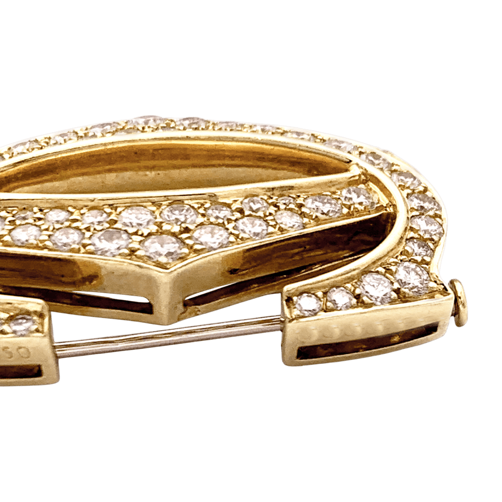 Brooch Cartier, "Double C", yellow gold, diamonds.