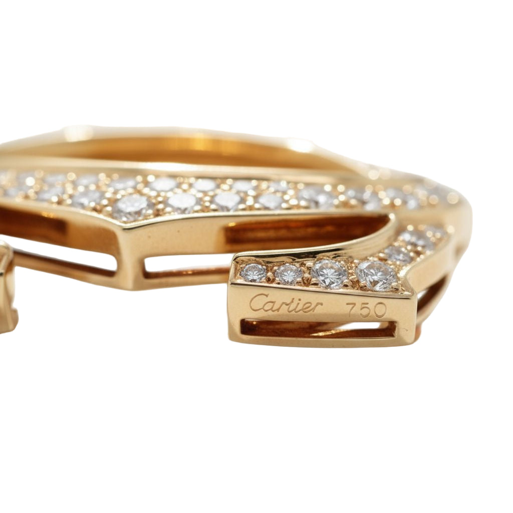 Broche CARTIER Double C en or jaune et diamants - Castafiore
