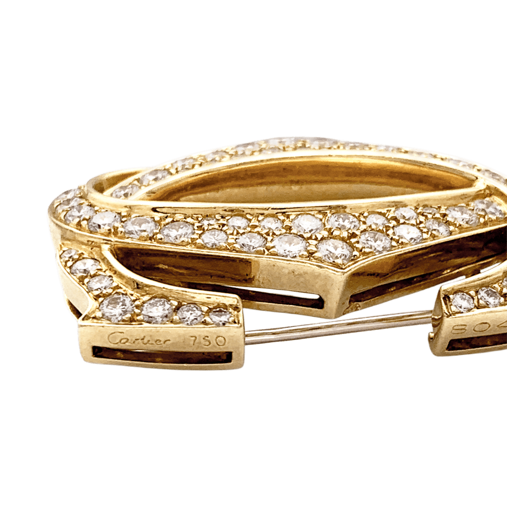 Brooch Cartier, "Double C", yellow gold, diamonds.