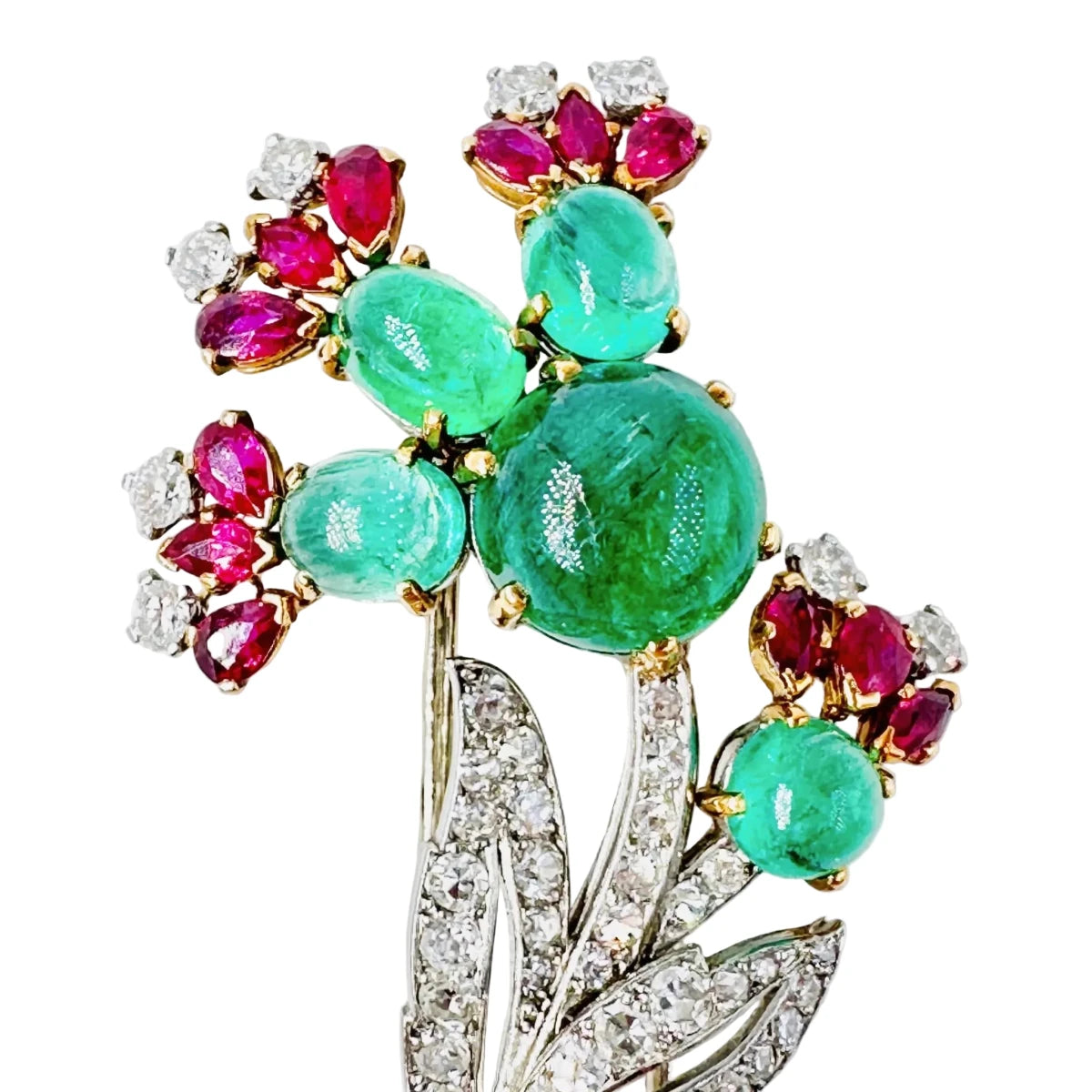 Broche CARTIER 'Fleur" en or blanc, émeraudes, rubis et diamants - Castafiore