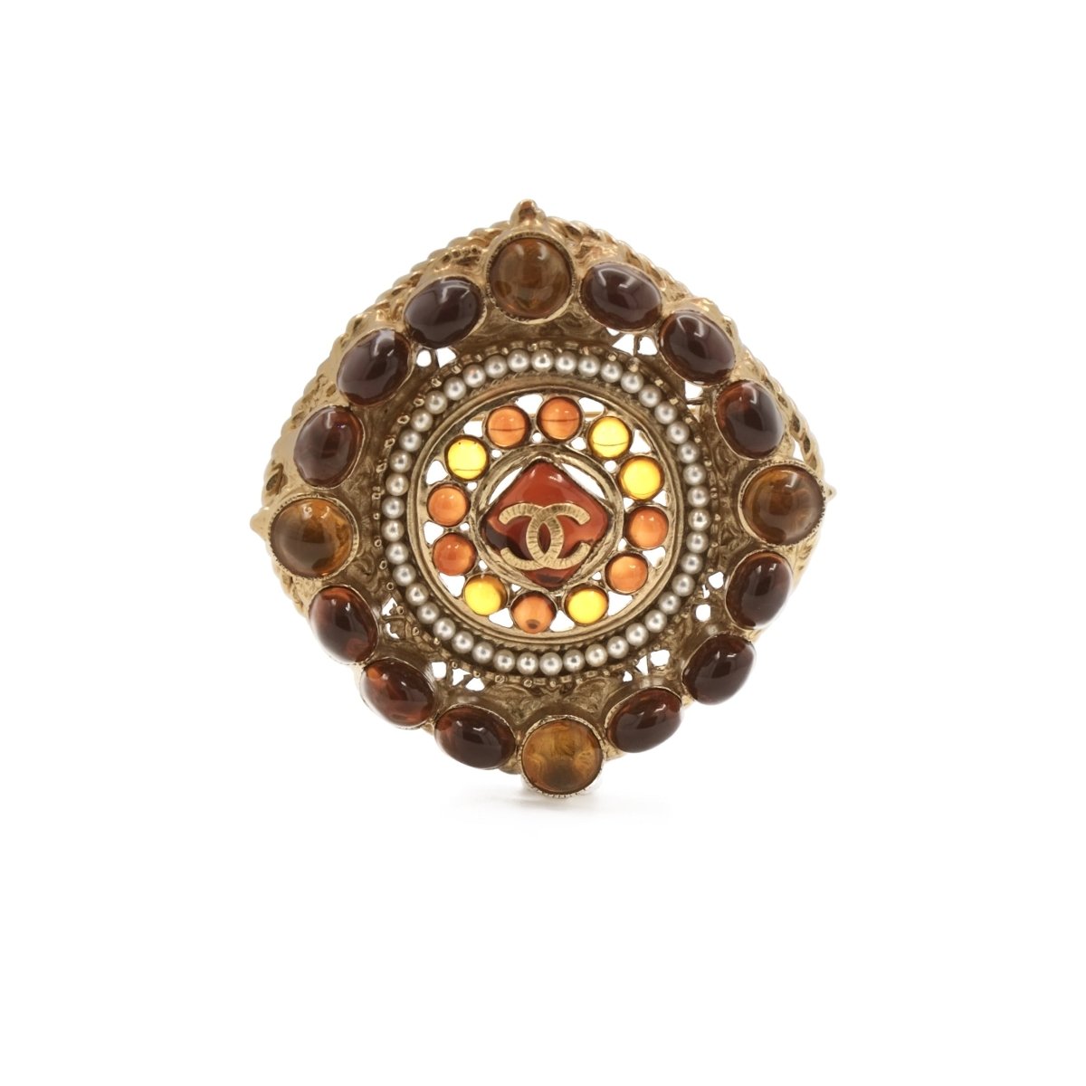 Broche CHANEL en métal, cabochons et perles - Castafiore