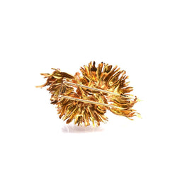 Broche CHAUMET en or jaune, rubis et diamants - Castafiore