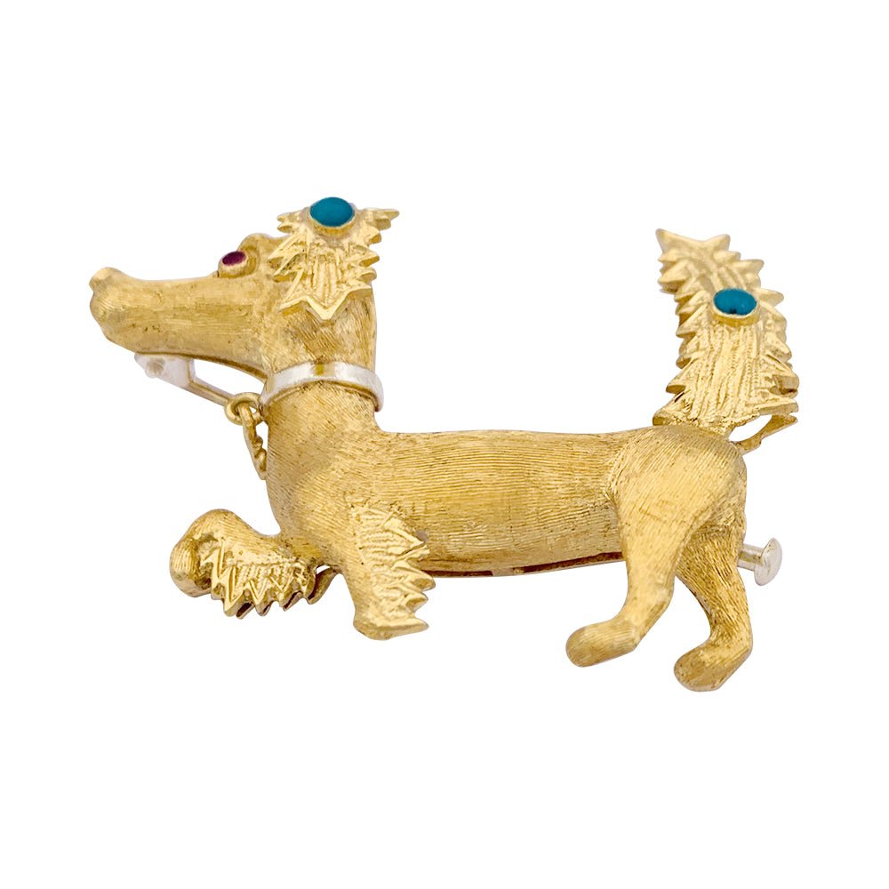 Broche Clip Bestiaire en or jaune, or blanc, rubis et turquoise - Castafiore