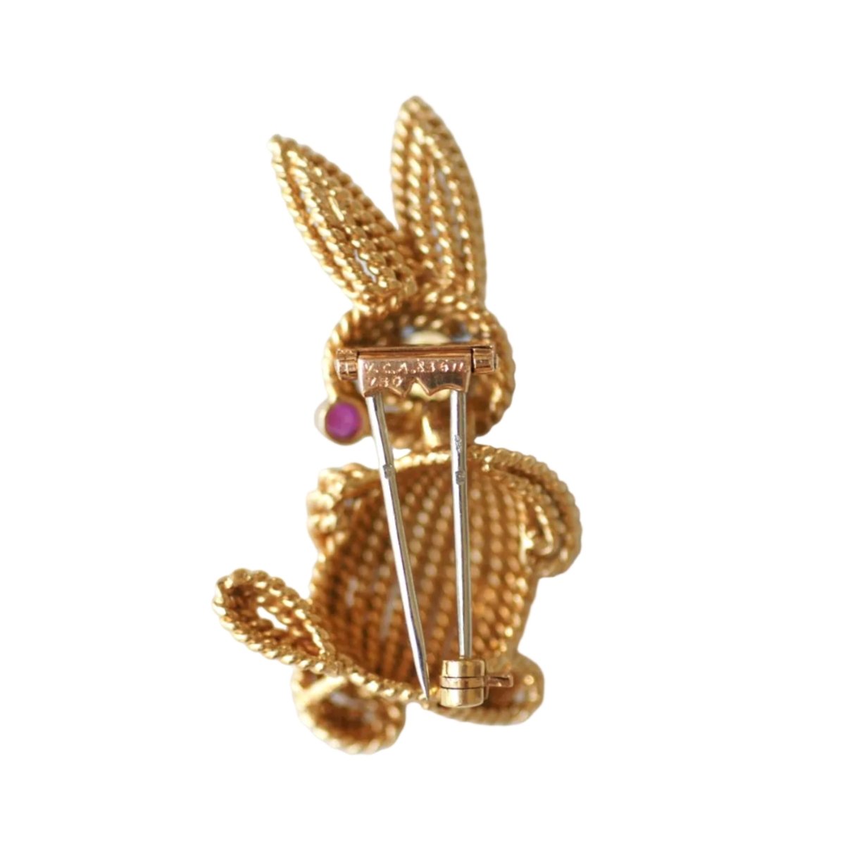 Broche Clip en or blanc, or jaune, émeraude, rubis et diamants - Castafiore
