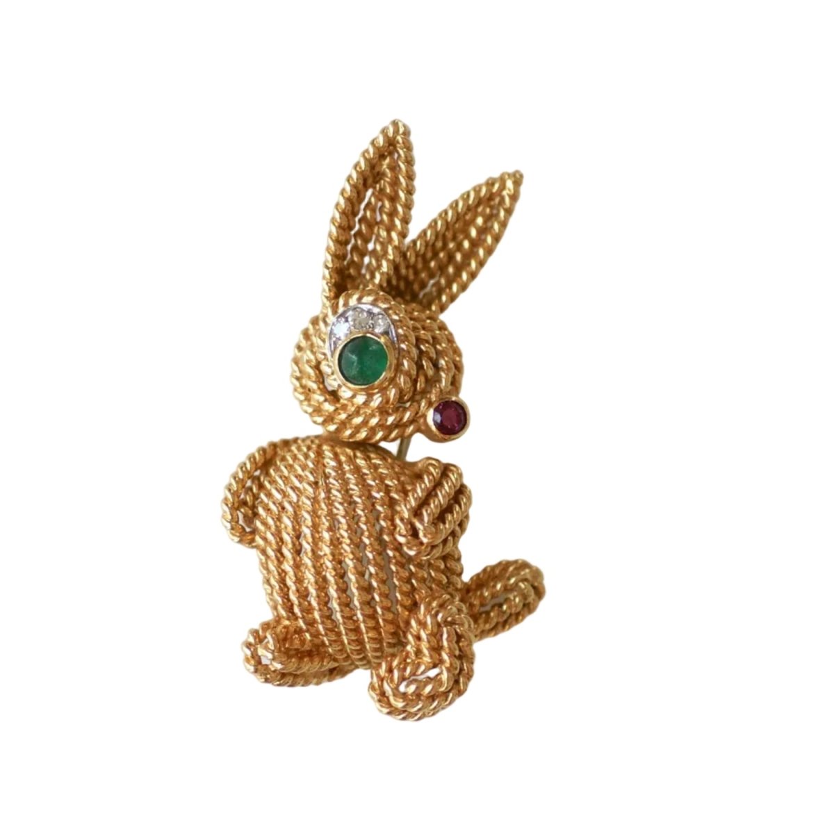 Broche Clip en or blanc, or jaune, émeraude, rubis et diamants - Castafiore