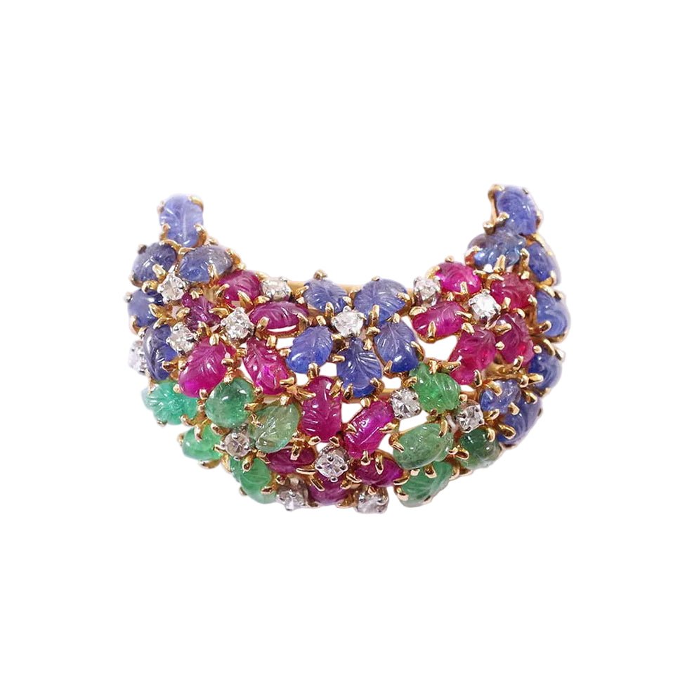 Broche Clip en or jaune, platine, saphirs, rubis, émeraudes et diamants - Castafiore