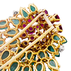 Floral clip, yellow gold, diamonds, emeralds, rubies.