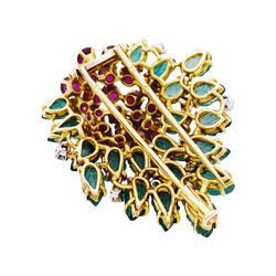 Floral clip, yellow gold, diamonds, emeralds, rubies.