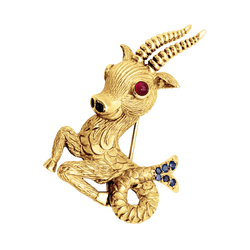 Broche Clip en or jaune, rubis et saphirs - Castafiore