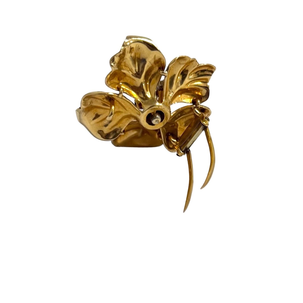 Broche Clip en or jaune, saphirs et diamants - Castafiore