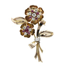 Broche Clip en or, platine, rubis et diamants - Castafiore