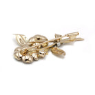 Broche Clip en or, platine, rubis et diamants - Castafiore