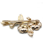 Broche Clip en or, platine, rubis et diamants - Castafiore