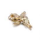 Broche Clip en or, platine, rubis et diamants - Castafiore