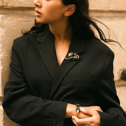 Broche Clip FRED "Panthère" en or jaune et émail - Castafiore