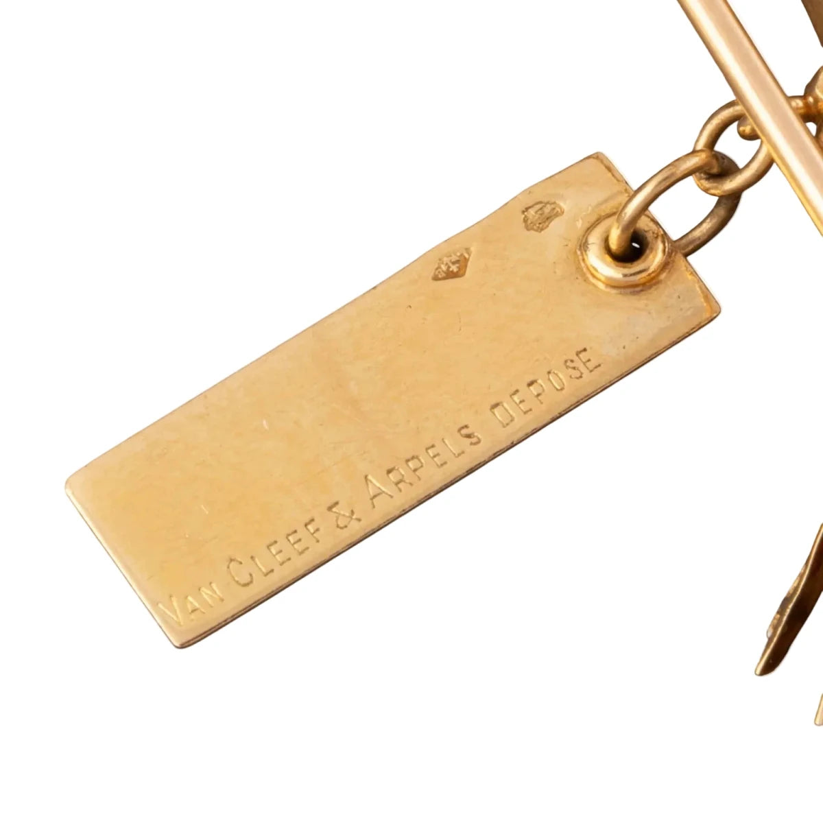 Broche Clip VAN CLEEF & ARPELS "Ne m'oubliez pas" en or jaune, saphirs et diamants - Castafiore
