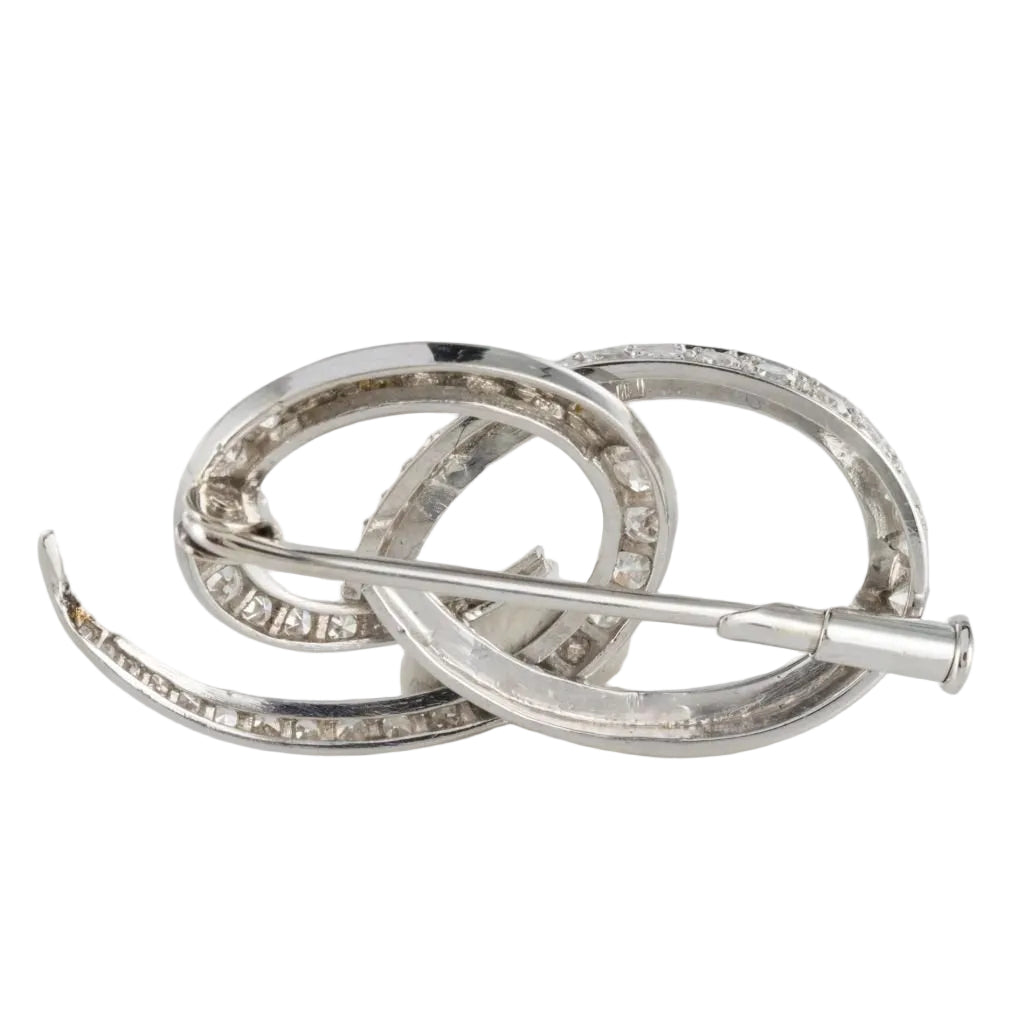 Broche en or blanc et diamants - Castafiore