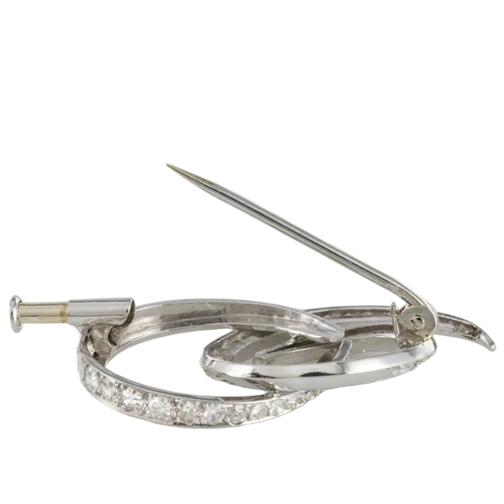 Broche en or blanc et diamants - Castafiore