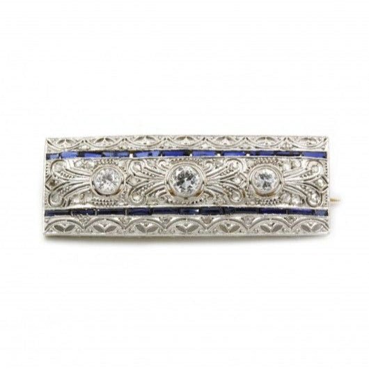 Broche en or blanc, platine, saphirs et diamants - Castafiore