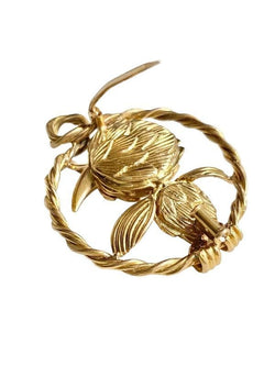 Broche en or jaune 18k et platine représentant un oiseau - Castafiore