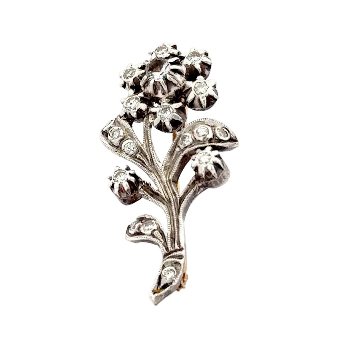 Broche en or jaune, argent et saphirs - Castafiore