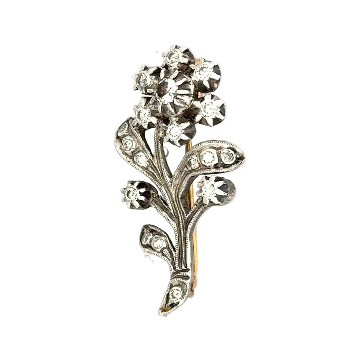 Broche en or jaune, argent, saphirs et diamants - Castafiore
