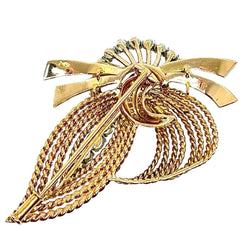 Broche en or jaune et diamants - Castafiore