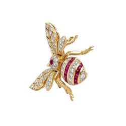 Broche en or jaune, rubis et diamants - Castafiore