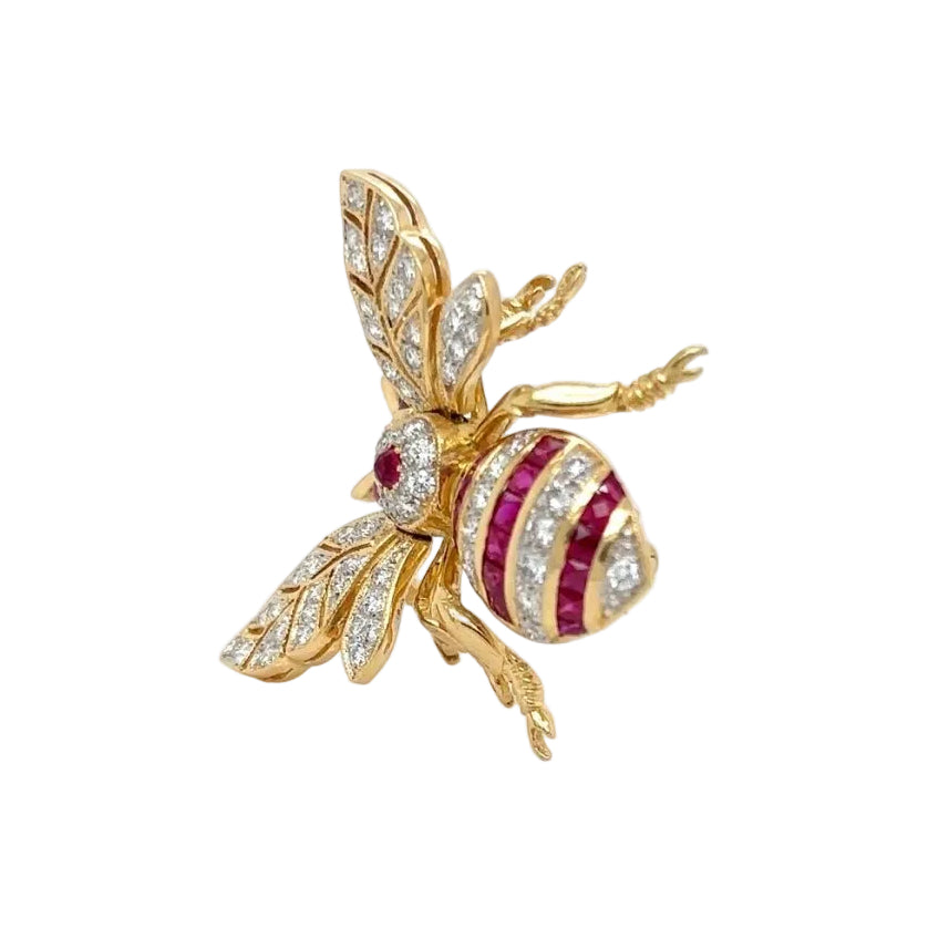 Broche en or jaune, rubis et diamants - Castafiore