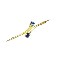 Broche en or jaune, saphirs et diamants - Castafiore