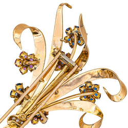 Broche en or rose, or blanc, rubis, saphirs et diamants - Castafiore