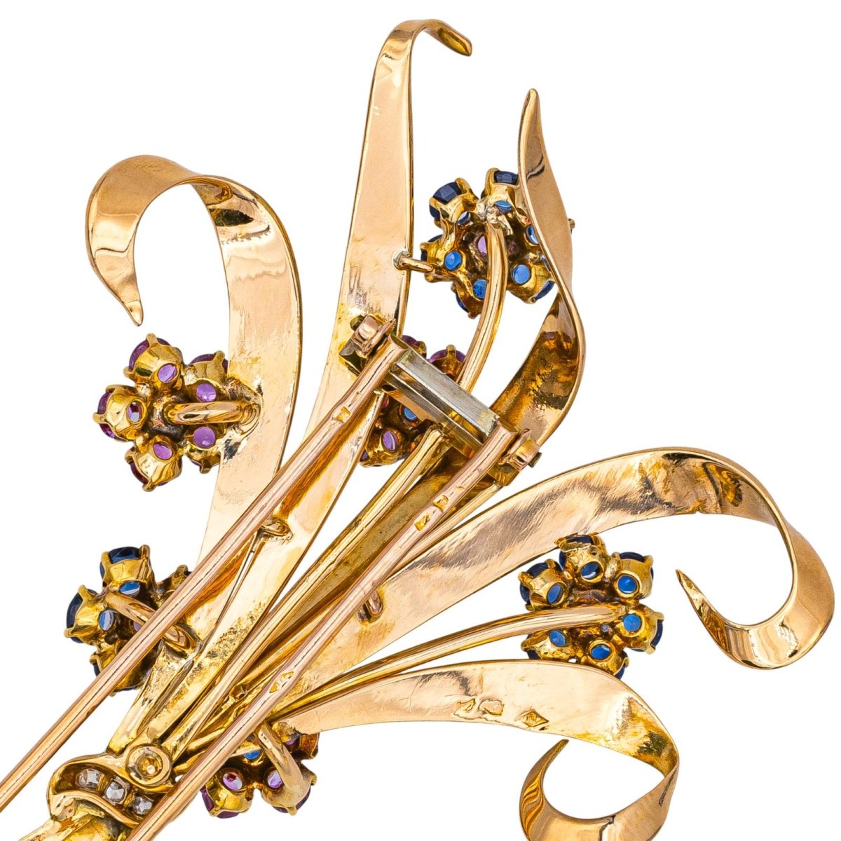 Broche en or rose, or blanc, rubis, saphirs et diamants - Castafiore