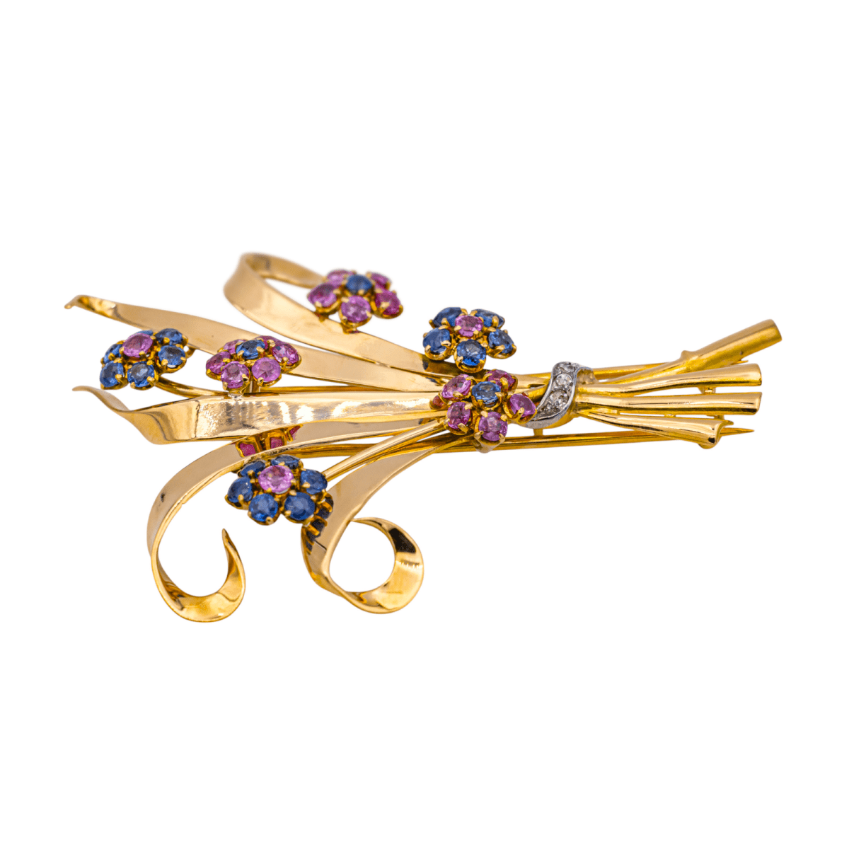 Broche en or rose, or blanc, rubis, saphirs et diamants - Castafiore