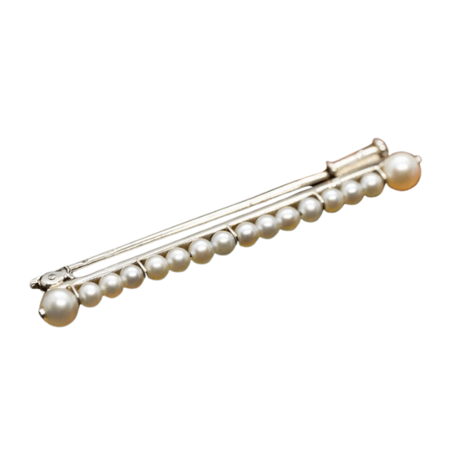 Broche Épingle CARTIER en or blanc et perle