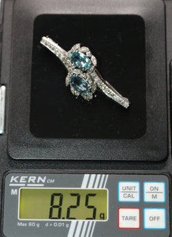 Broche Épingle en or blanc, aigues-marines et diamants - Castafiore