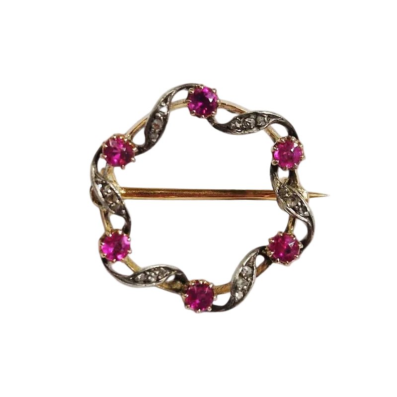 Broche Épingle en or blanc, or jaune, saphirs et diamants - Castafiore