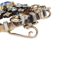 Broche Épingle en or jaune, argent, saphirs et diamants - Castafiore