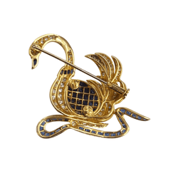 Broche Épingle en or jaune, saphirs et diamants - Castafiore