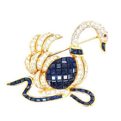 Broche Épingle en or jaune, saphirs et diamants - Castafiore