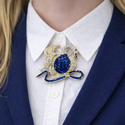 Broche Épingle en or jaune, saphirs et diamants - Castafiore